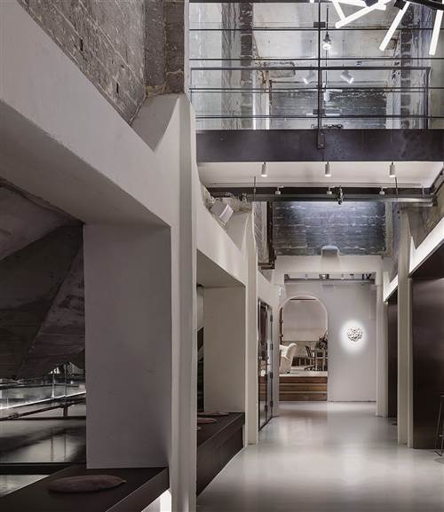 Hotel Ottilia  Lobby Bar - Modern Industrial Interior Corridor With Glass Railings