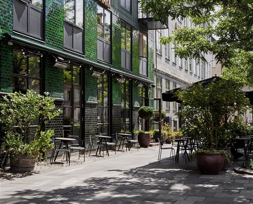 Outdoor Hotel Restaurant Seating on Tree-Lined Street Copenhagen